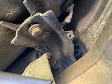 Remove (4) 13mm screws that hold cross mount