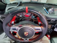 steering wheel cover with racing line and carbon fiber. 