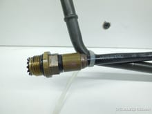 Also, I was looking up the pressure hose, this picture has a black spacer between the connectors where I have a leak. Could it be the lack of this thats causing the leak? Can anyone confirm what the connectors look like on their boxster? I have a 1999 986.