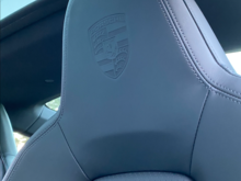 Porsche embossed headrest crests