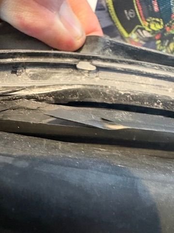 These were cut in palce for every spade connector allowing the wires to fit better and lay flat. Even the seal I installed on my C2 slick top project had the holes in 22. So it has to be from then on that they switched providers.  