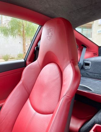 Porsche crest on the adaptive sport seats