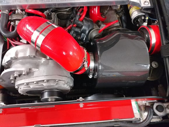 CF airbox with oiled K&N filter enclosed for a true cold air intake to the supercharger