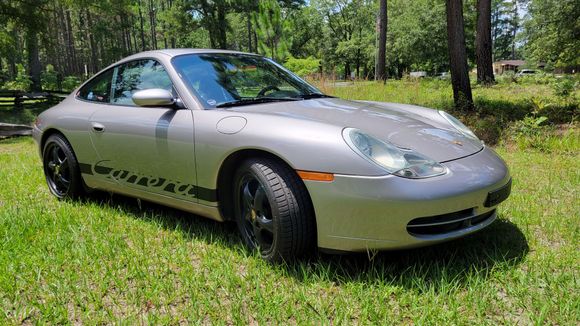 I'm told the meridian metallic is a tinted neutral with red undertones. It is kind of reddish or something at times in the sun. I might try a flat pale red color Carrera decal in place of the black at some point.