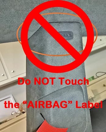 Do not touch this label. It is glued and clipped permanently to the B-Pillar Cover.