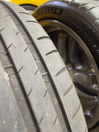 Inner edge  of front tire #1