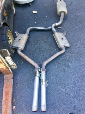 This is the old exhaust system. Tubing varies from 2" to 1.75". That Y pipe is no larger than 2" at the final exhaust inlet. Very restrictive.