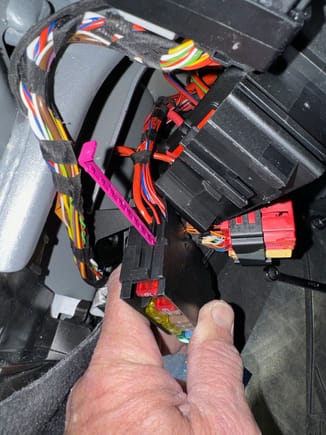 Releasing or adding terminals requires that the secondary release be removed - the secondary release is the pink lever partially removed in this photo.