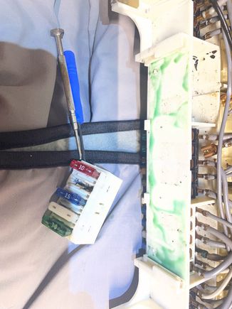 Used to small screw drivers to depress tabs (see tabs in the next photo). Approach from the wire side and push the socket out.  This is a good video:  https://www.youtube.com/watch?v=uXp3Ve7Fk3s 