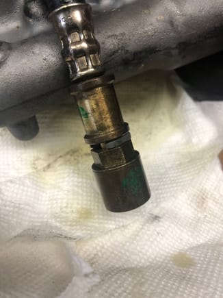 Old line with connector needed. Remove that grey clip and cut in that space with a hack saw then the cut piece will come out with the lock on it