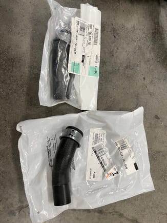 The GT2 "adapter" hoses that connect to the center radiator.  In the pictures showing both the Supply and Return hoses, you can see the Henn coupler used to secure the hose to the radiator.  These two hoses are /L (996-106-638-76) and /R hoses (996-106-639-76).