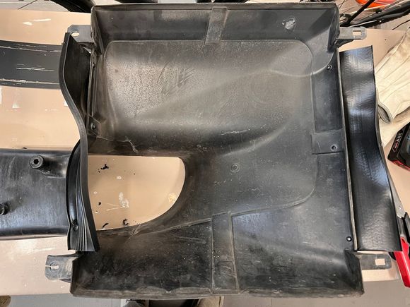 cut up the rubber seal material and attach with some large flange rivets...