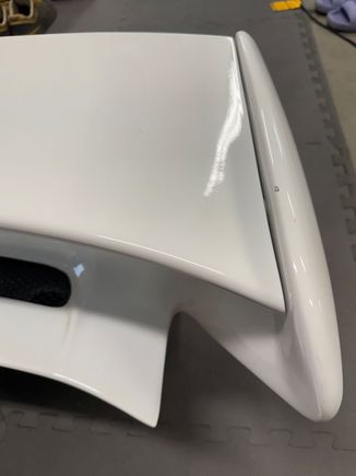 Chip on top of wing-end (driver side)