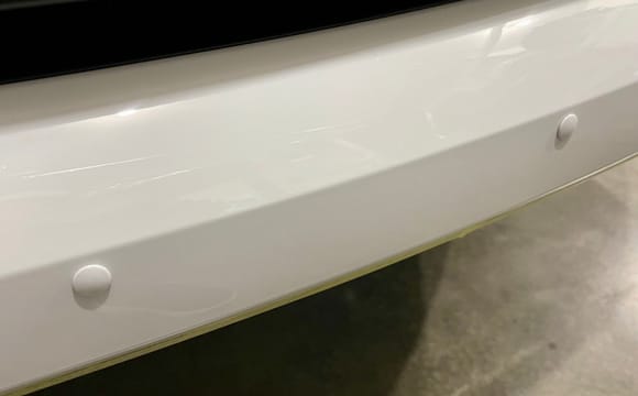 www.bumperplugs.com 
Pre-painted to factory Porsche color
(No affiliation) 