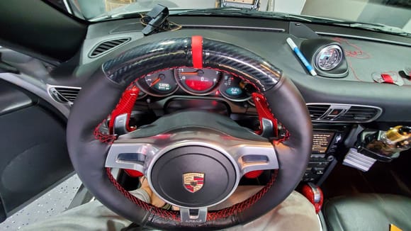 steering wheel cover with racing line and carbon fiber. 