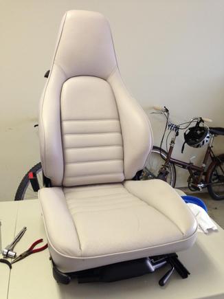 The driver side seat ready to go. I will say that the surface feels a bit rough. I buffed the seats with a cloth and that did help and perhaps the surface will feel smoother over time. I blame this on spray gun inexperience and not the product. It isn't too bad and the improved looks more than compensate.