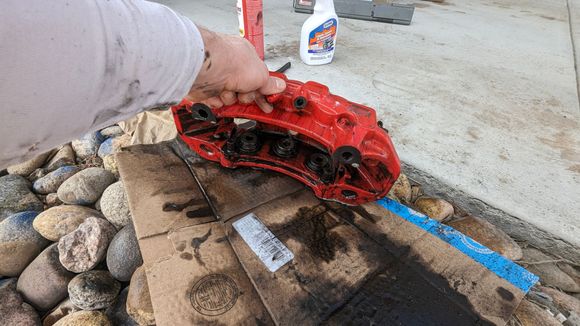 Trying my best to clean probably over a decade of brake dust and gunk off these calipers without ruining the paint