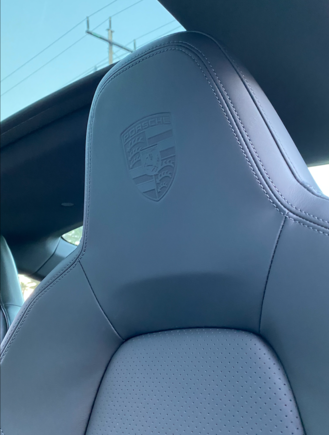 Porsche embossed headrest crests