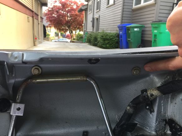 water leaked from bolt holes.  plastic washer wasn't making a water tight seal