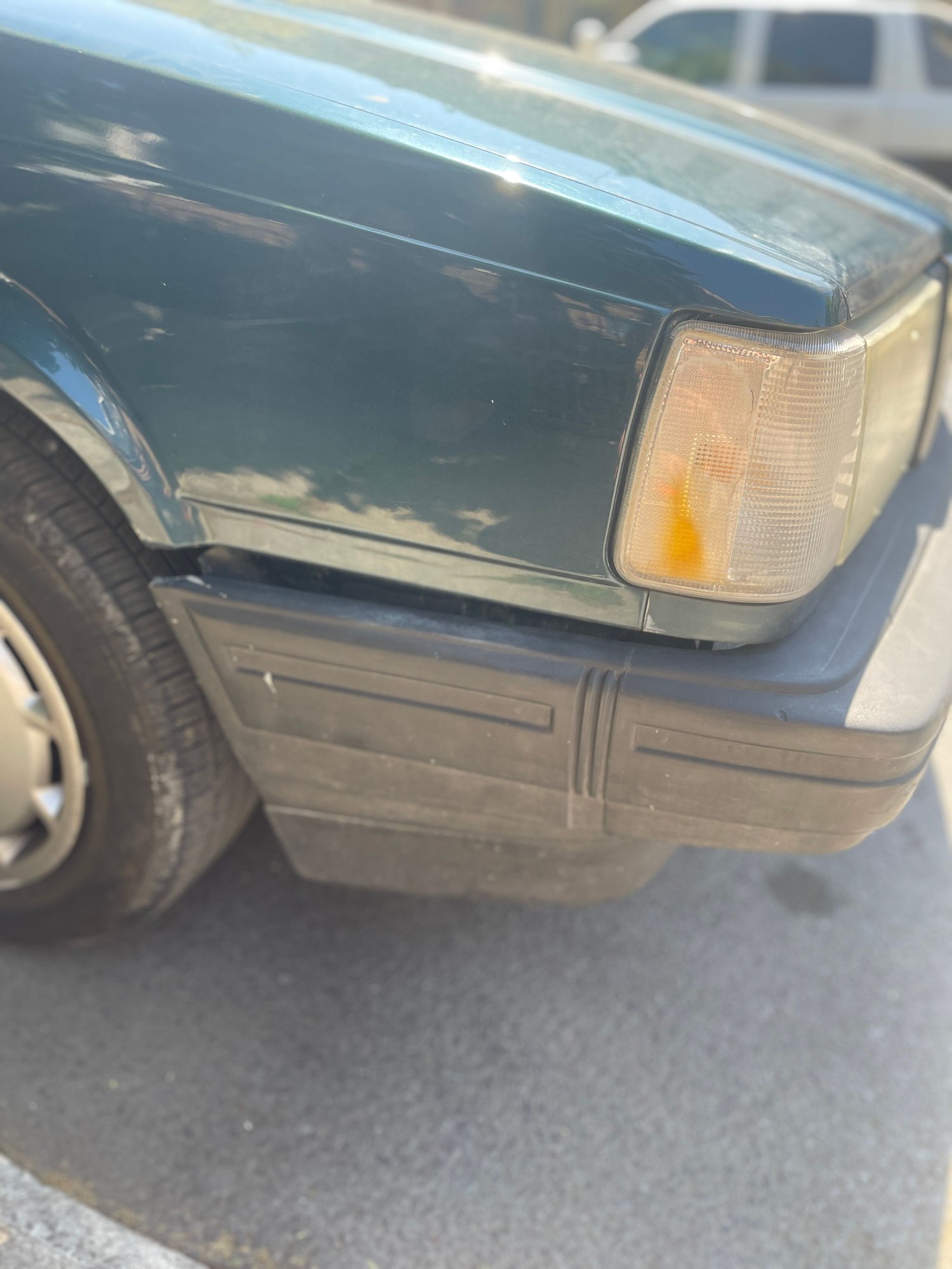 overall situation - sagging passenger side bumper. 