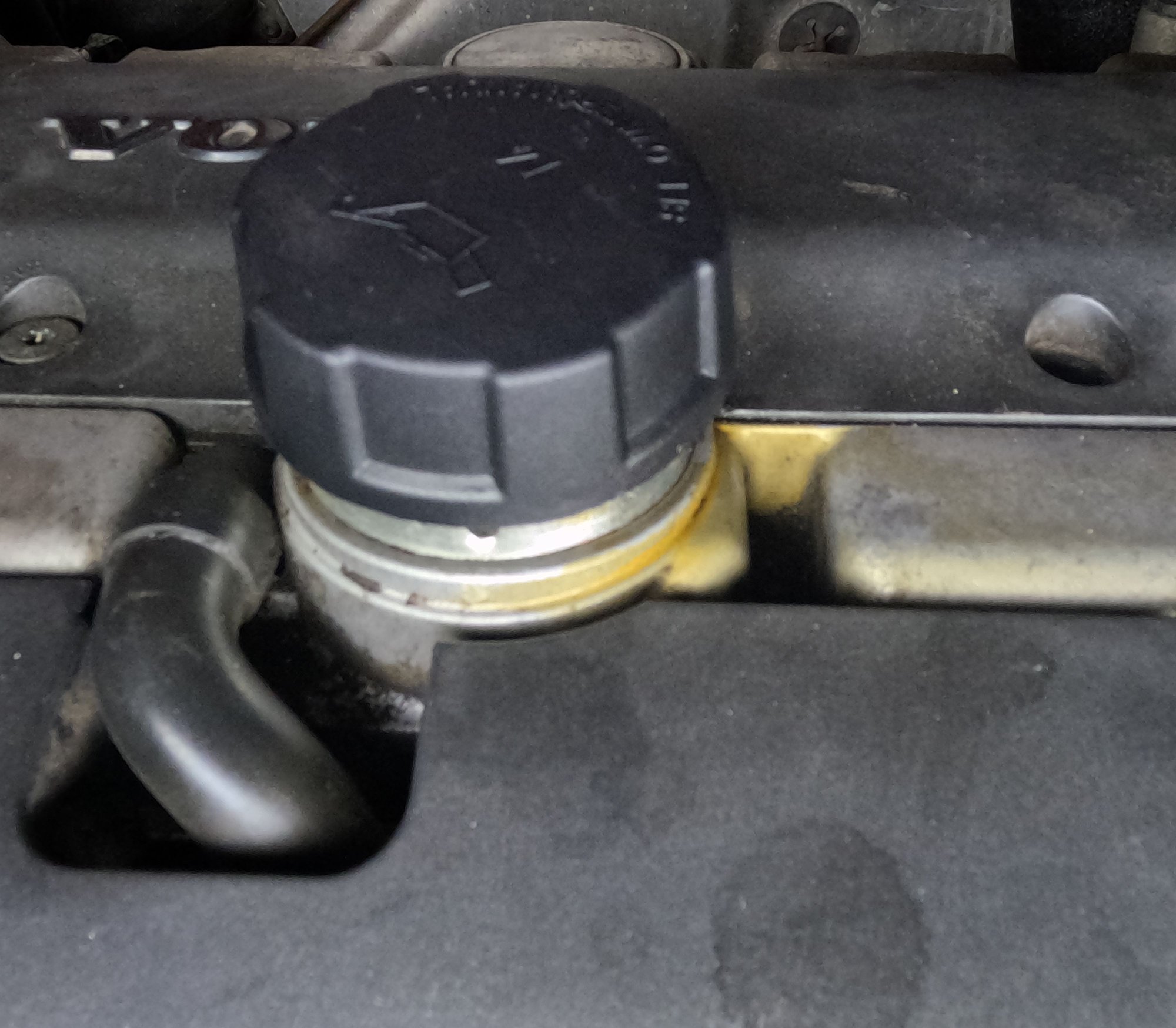 I replaced this oil cap sometime back but maybe its still leaking? or stained im unsure
