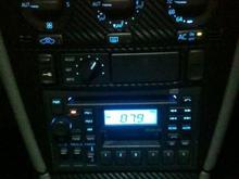 Center console and radio. I also put some DiNoc carbon fiber vinyl on instead of the wood grain