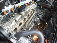 Front view of engine compartment after taking off the minimum of what I needed to remove in order to replace the PCV system.  Still was tight working when it came time to put the ETM back.  But workable...