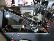 See cross member with fittings for rear pins and fittings beside shifter cover. 
