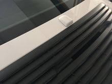 Does anyone here on the forum have experience removing the white piece of plastic below the wind shield. I am assuming it's an antenna. I am planning to put on a decal/ stripe there. 

Thanks!!