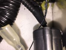 This is what it connects to, it appears to be some sort of capacitor or solenoid