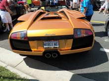 Amazing color on this Lamborghini Murcielago Roadster at a car show in Fairfax, Virginia. What a fitting license plate.