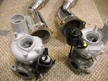 Another picture of the upgrades. the compressor wheels are 44mm similar to WRX STI and the housings were machined to fit them. The stock ones were