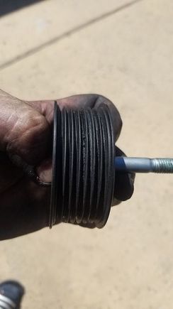 This is the other idle pulley before cleaning.

