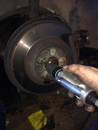 Drill the soft alloy head off .