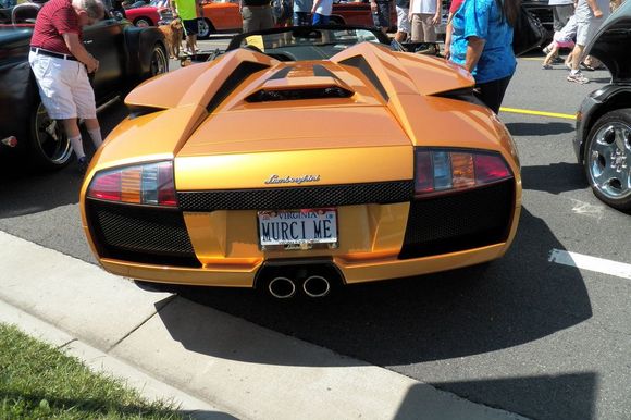 Amazing color on this Lamborghini Murcielago Roadster at a car show in Fairfax, Virginia. What a fitting license plate.