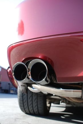 Rear view of new Fabspeed tips with Agency-Power exhaust mufflers behind them, added March 2010.  The sound out of these mufflers coming out of these BEAUTIFUL tips is awesome to the ears!!