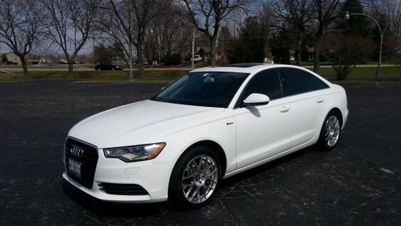 Ibis White.  Premium plus.  Velox Apex Wheels with Audi Rings 51mm sticker, Yokohoma YK580 tires, 32% tint on all 7