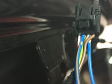 No cutting of factory harness. 
Friction fit the wire into the connector and zip tied