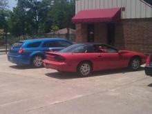 My Z next to my step dads magnum
