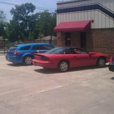 My Z next to my step dads magnum