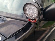 Light mounted - it is not wired in the wire is just tucked under the hood.
