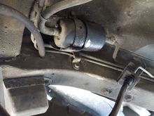 old leaking fuel filter, easy replacement.