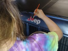 She wanted to paint the JEEP emblem red....so I let her!