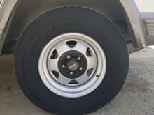 My grandpa told me to spray bleach white on the tires and rims then pressure wash it, I'm really happy with how it came out.