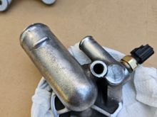 Thermostat housing prior to paint. 