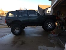 This is a couple pics of my son's '94' Cherokee.  Great suspension but it had a lot of other issues that were bleeding him dry so he sold it.  It had a Rusty's long arm lift with 36" Mickey Thompsons.