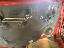 Here are the rest of the door panel connections; 2 Blue Plugs “A” and “B,” and the Latch Mechanism connection rods.