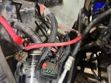 This one is in the battery compartment area, not sure what it would plug into. 