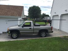 Moving the 24 foot sticks of tubing. Over hangs the back by 8 feet. (Also this was my first vehicle)