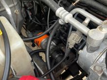 No plug wires from coolant reservoir to engine block. Cleaner IMO